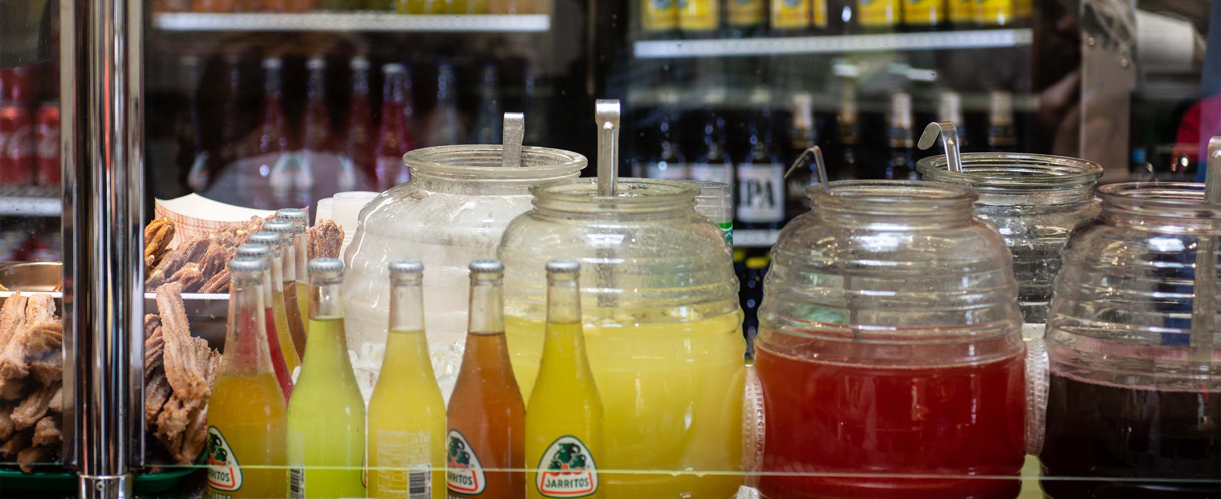 Traditional Mexican Aguas, or fresh friuit juices.