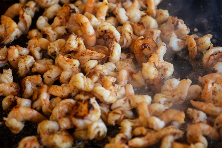 Cooking shrimps to be used in tacos, burritos and quesadillas.